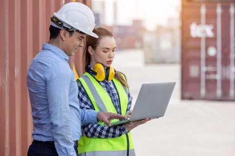 Two person foreman engineering helmet wear white safety are working computer  Stock Photos