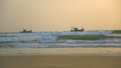 Two person walking in the goa beach at sun set time Video stock 216575390
