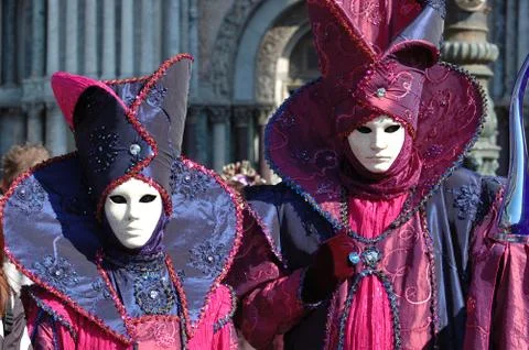 Two persons in costume at st. mark's square during the carnival of venice,italy Foto stock