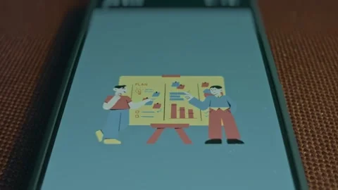 Two persons discussing the details of the plan displayed on the board Stock-Footage 309687634