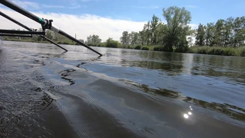 Two Persons Rowing On A River Stock Footage 205187760