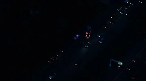 Two Perspectives of Car Crash at Night - Aerial Stock Footage 10577914