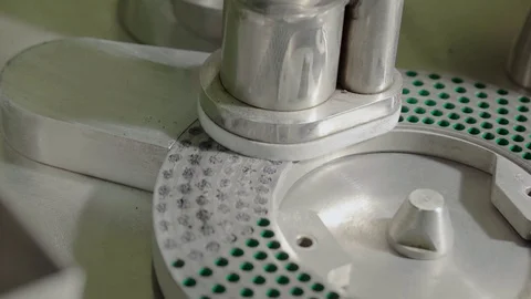 Two-piece blue-green hard shelled capsules powder dosing. Stock Footage 102457304