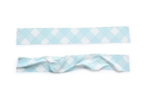 Two pieces of blue plaid patterned washi tape, one straight and one wrinkled, Stock Photos