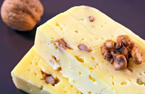 Two pieces of cheese Stock Photos