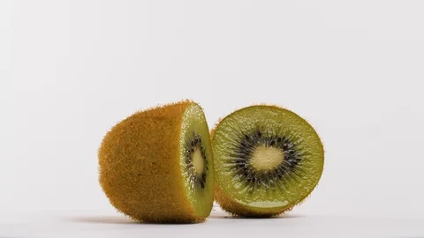 Two pieces of kiwi fruit Stock Footage 101944206
