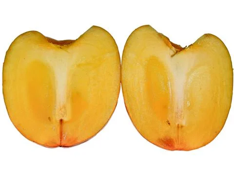 Two pieces of persimmon fruit isolated on white Fotos de archivo