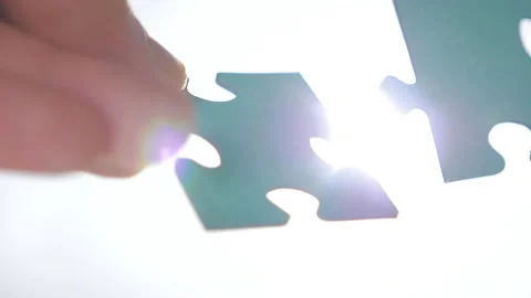 Two pieces of puzzle are interconnected. Problem solution concept. Relationships Stock Footage 132427822