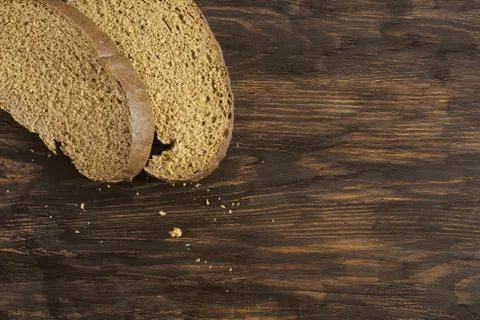 Two pieces of rye bread on the table Stock Photos