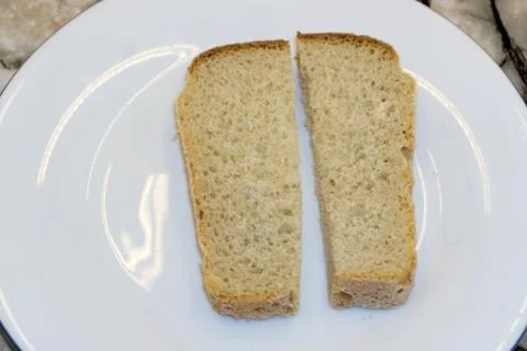 Two pieces slide of bread isolated on the white background. Stock Photos