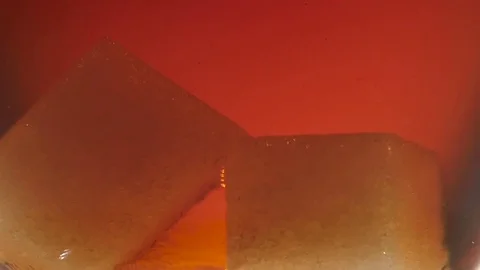 Two pieces of sugar melt at the bottom of cup Stock Footage 73851880