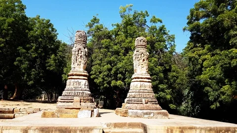 Two pillars standing alone near the temple, act as The Torana or Arched Video stock 116225792