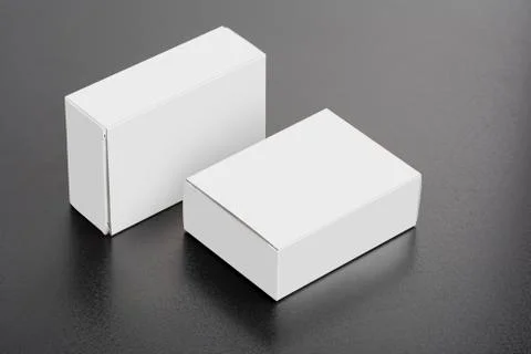 Two pillboxes packages on dark background mock-up series Stock Photos
