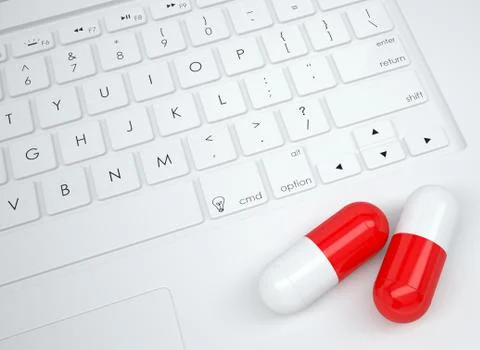 Two pills on the keyboard Stock Illustration