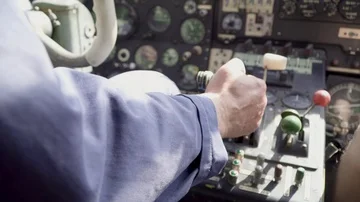 Two pilots fly the plane, Cockpit interior of old airplane with all the switches Stock Footage 85515883