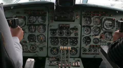Two pilots fly a plane, sitting at the controls Stock Footage 65116711