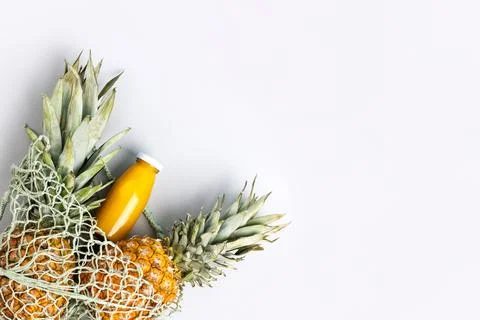 Two pineapples and juice Stock Photos