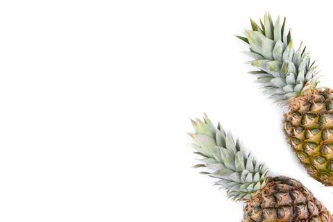Two pineapples isolated on white background, close up Stock Photos