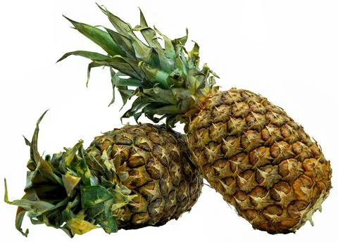 Two Pineapples on a white background. The perfect shot for diet and healthy n Stock Photos
