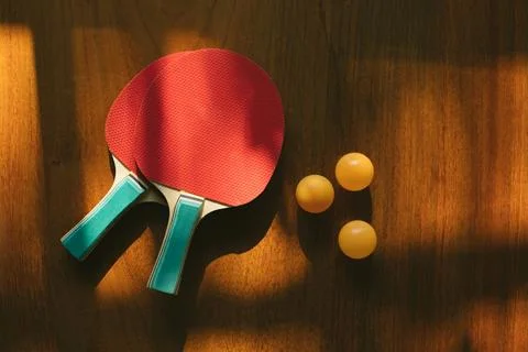 Two ping pong rackets on table Stock Photos