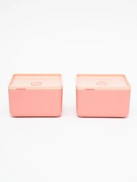 Two pink bento boxes side by side Stock Photos
