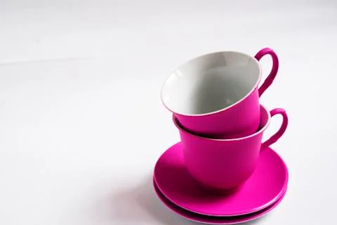 Two pink ceramic Cup on white background Stock Photos