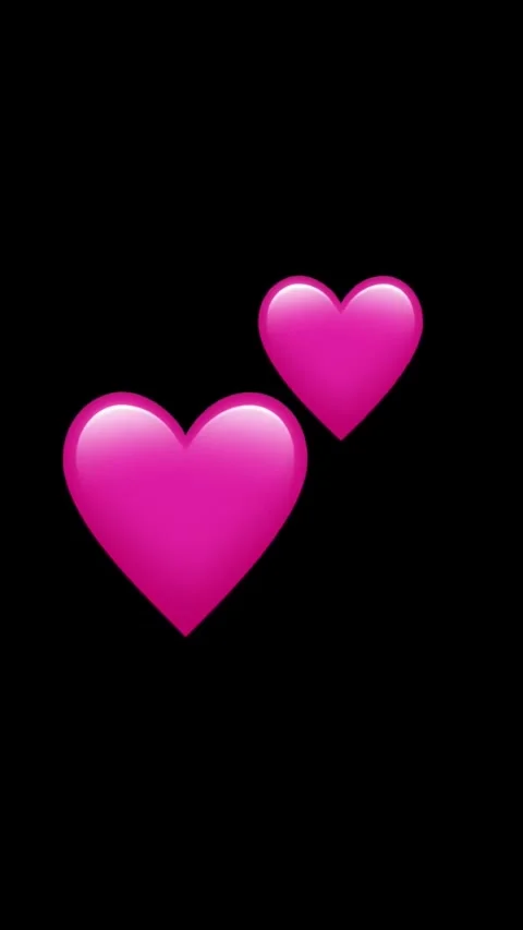 Two pink hearts floating on black background animated Stock Footage 329406340
