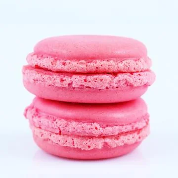 Two pink macaroons isolated on white Stock Photos