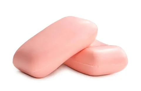 Two pink soap bars stacked on a white background Stock Photos