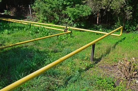 Two pipes come out of the gas distribution point Stock Photos