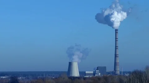 Two pipes of power plant with white steam.  Stock Footage 70748053