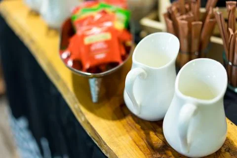 Two pitchers put on the coffee table. Stock Photos