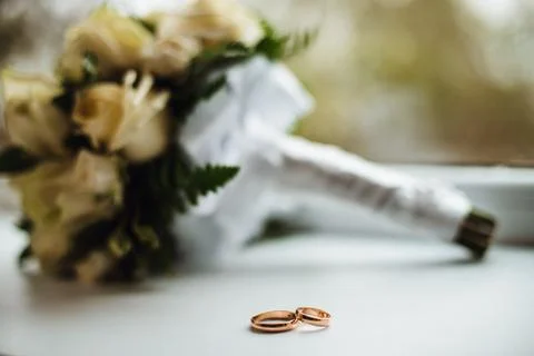 Two plain golden wedding rings Stock Photos