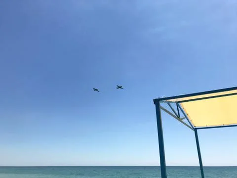 Two planes in the blue sky. Stock Photos