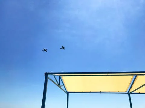 Two planes in the blue sky. Stock Photos