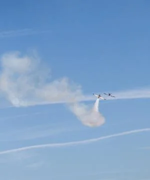 Two Planes Race in the Sky Stock Photos