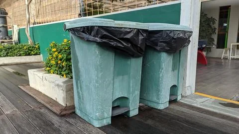 Two plastic bins that looked old and dirty. Stock Photos