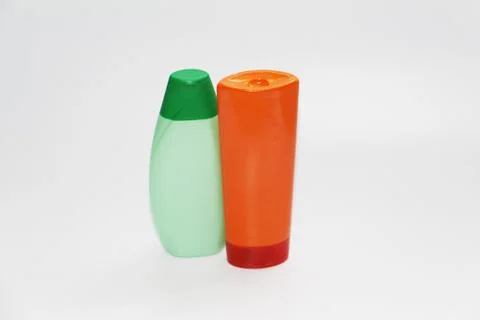 Two plastic bottles on a white background. Bottles without labels. Stock Photos