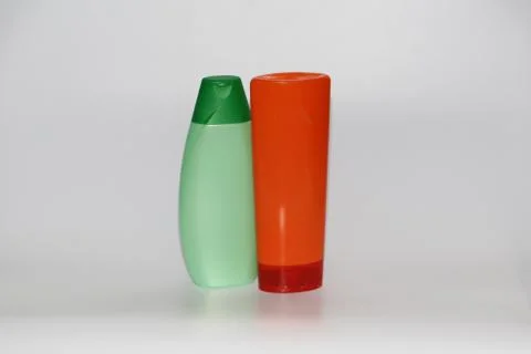Two plastic bottles on a white background. Bottles without labels. Stock Photos