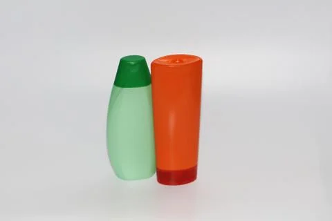 Two plastic bottles on a white background. Bottles without labels. Stock Photos