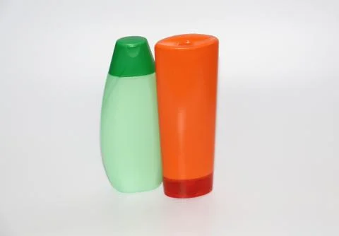 Two plastic bottles on a white background. Bottles without labels. Stock Photos