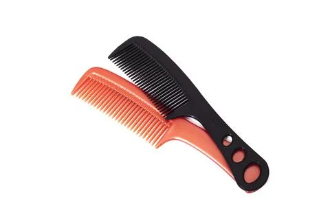 Two plastic combs isolated on white background Stock Photos