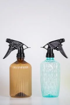 Two plastic spray bottles on light background Foto stock