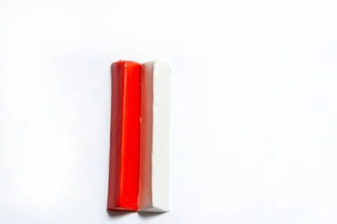 Two plasticine bars on a white background. Stock Photos