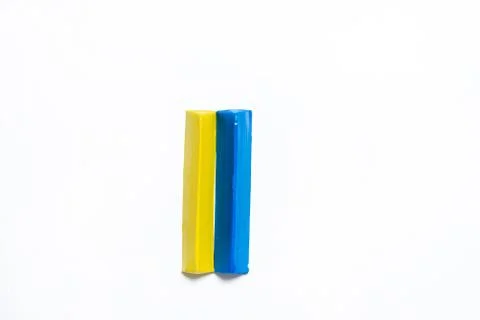 Two plasticine bars on a white background. Stock Photos