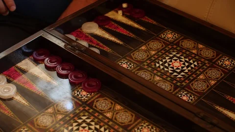 Two players playing Backgammon board games leisure game Stock Footage 86121742