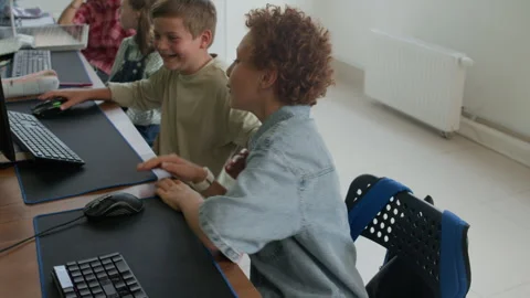 Two Playful Cheerful Schoolboys Having Fun at Lesson of Programming Stock-Footage 316478751
