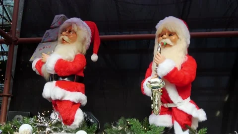 Two playing Santa Clauses in the shop  Stock Footage 165728273