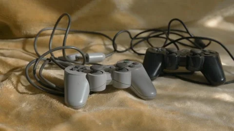 Two PlayStation Dual Shock controllers Stock Footage 318606128
