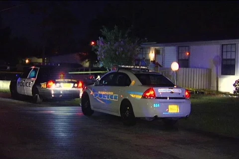 Two Police Cars Parked Outside Residential Area Stock Footage